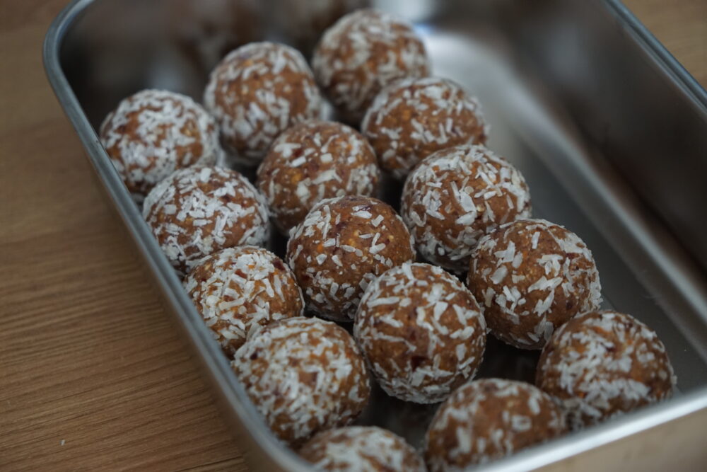 coconut balls in an airtight container