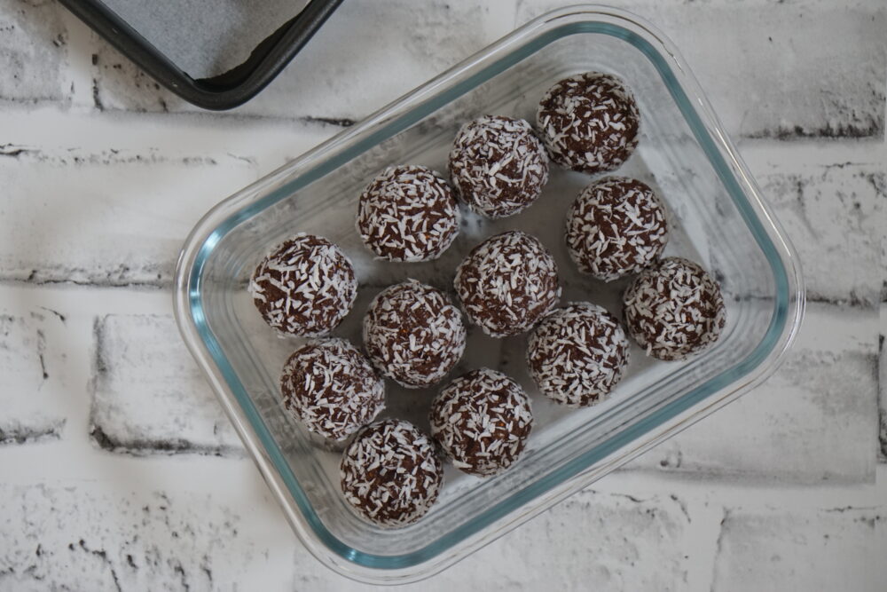 coconut protein balls in container