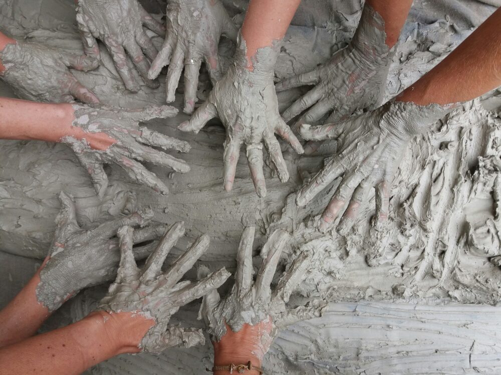 hands in clay